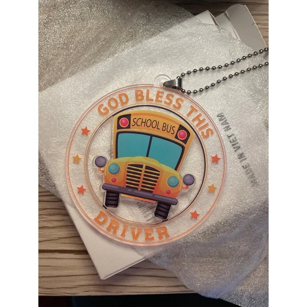God Bless This Driver acrylic car hanging ornament, commonly used as a rearview